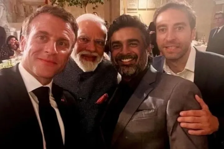 R Madhavan poses with PM Modi and French President Emmanuel Macron